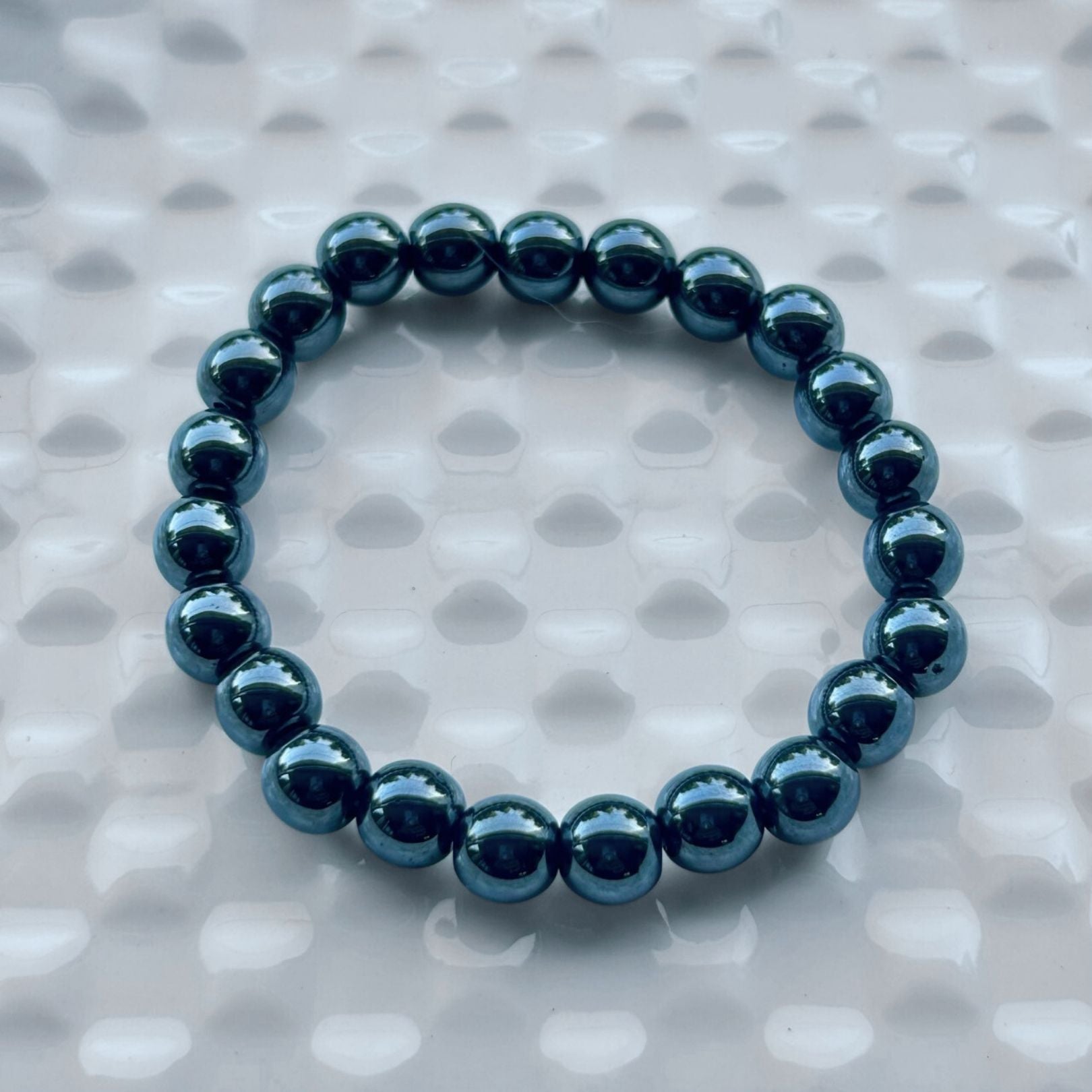 https://kailasharudraksh.com/cdn/shop/files/hematite-bracelet.jpg?v=1758192609